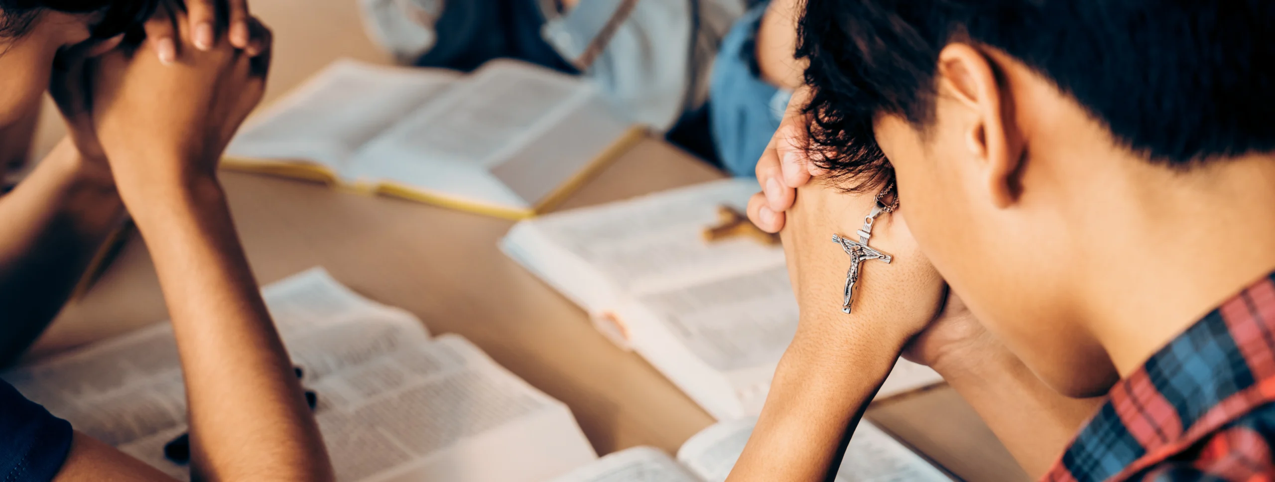 group-christian-pray-god-while-holding-iron-cross-closeup-burgeoning